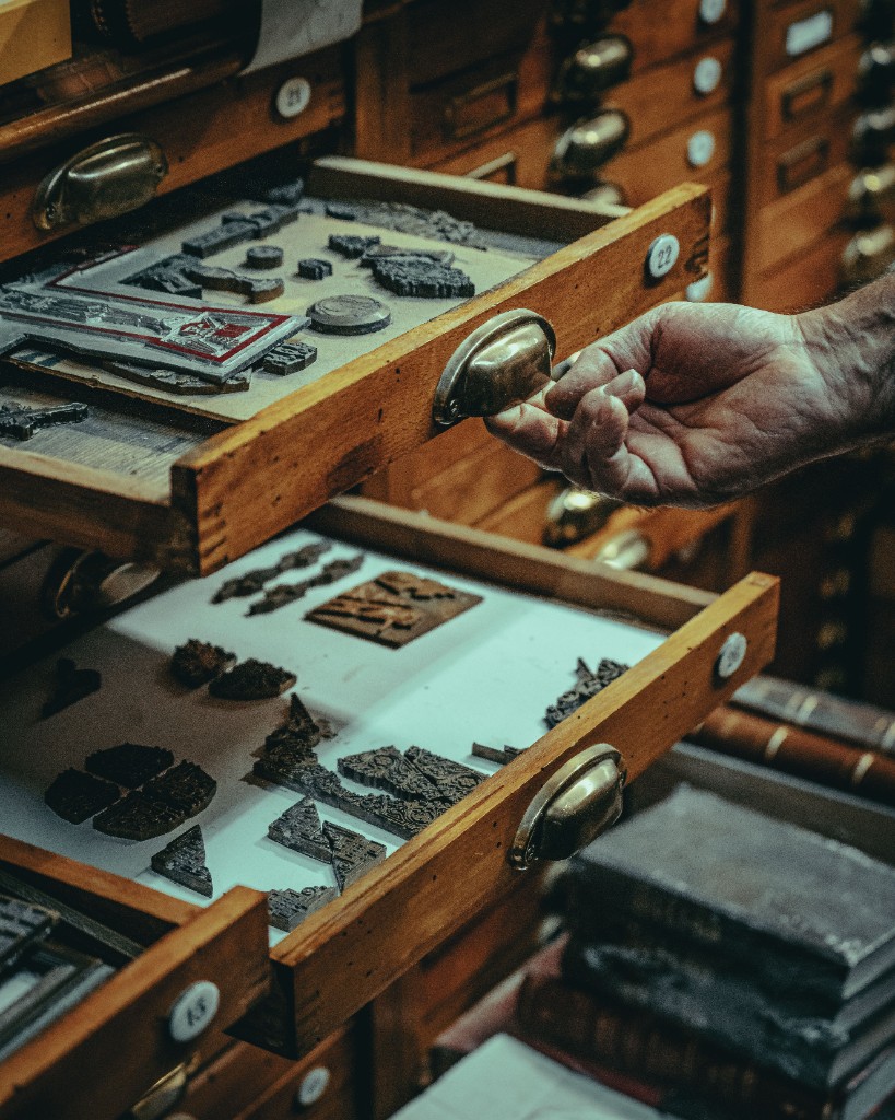 Hand-carved wooden printing blocks stored in workshop drawers
